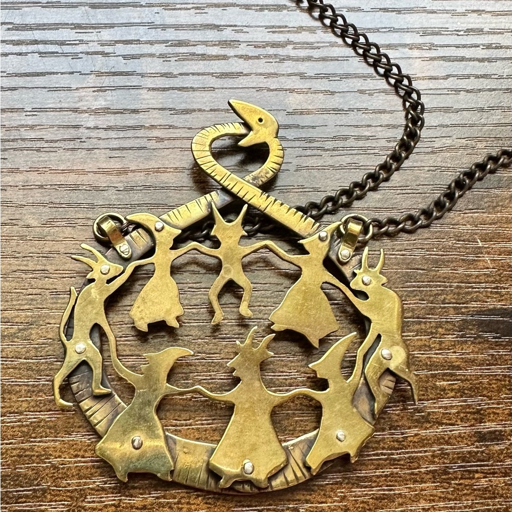 Witches and demons dancing necklace